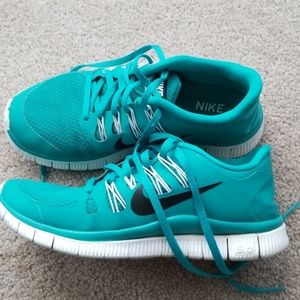 Teal Nike Free 5.0 shoes
